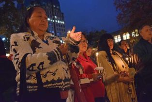 women holding candles