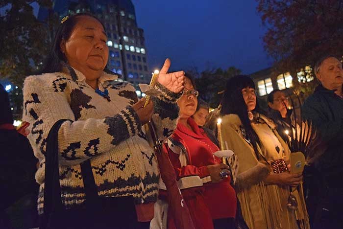 Candles flickered for Sisters in Spirit