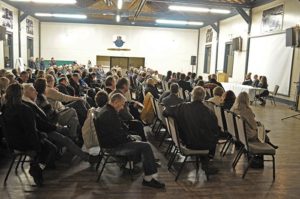 crowd at a meeting