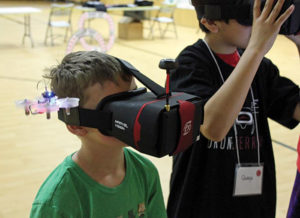 kids testing out drones