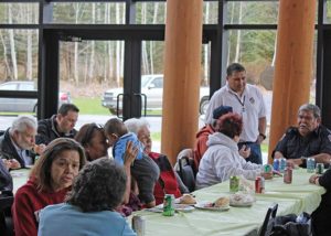 people eating at a community lunch