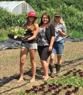 women in a vegetable garden