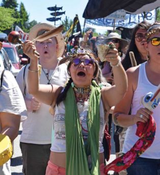 protestors march against Kinder Morgan pipeline