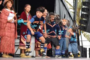 Coast Salish dancers perform