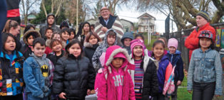 Robert Janning with Snuneymuxw children