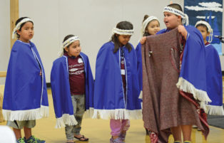 indigenous students make a presentation