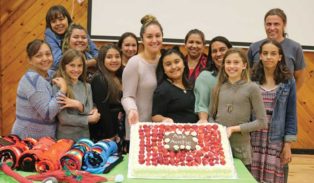 program participants celebrate with a cake